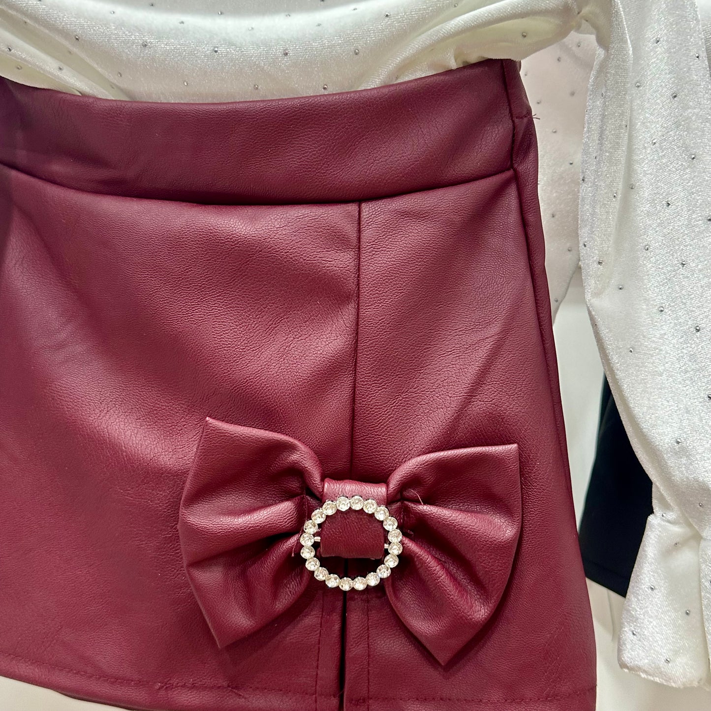 Conjunto falda pantalón poli piel