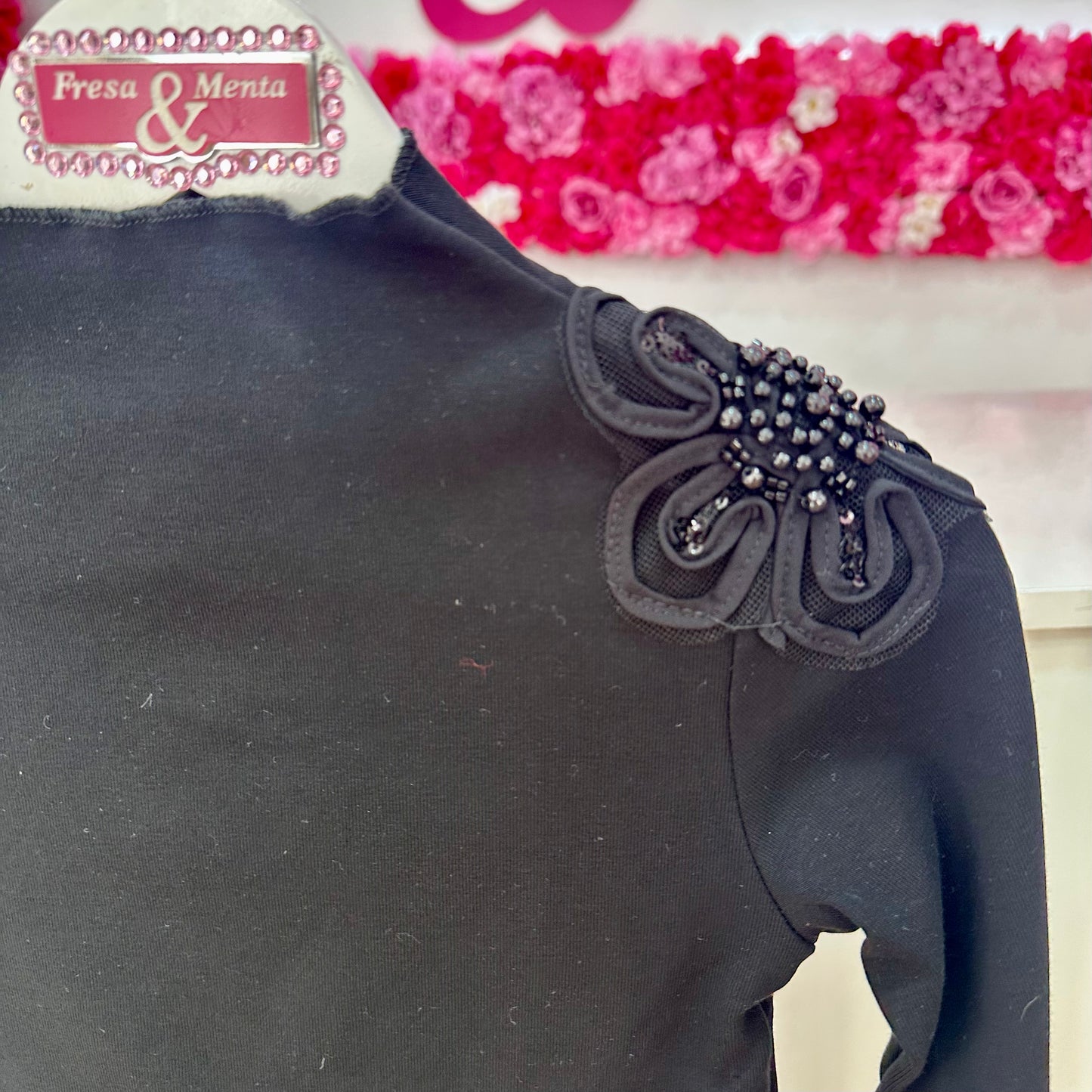 Jersey cuello con bolitas