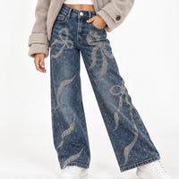 Jeans lazos brillos
