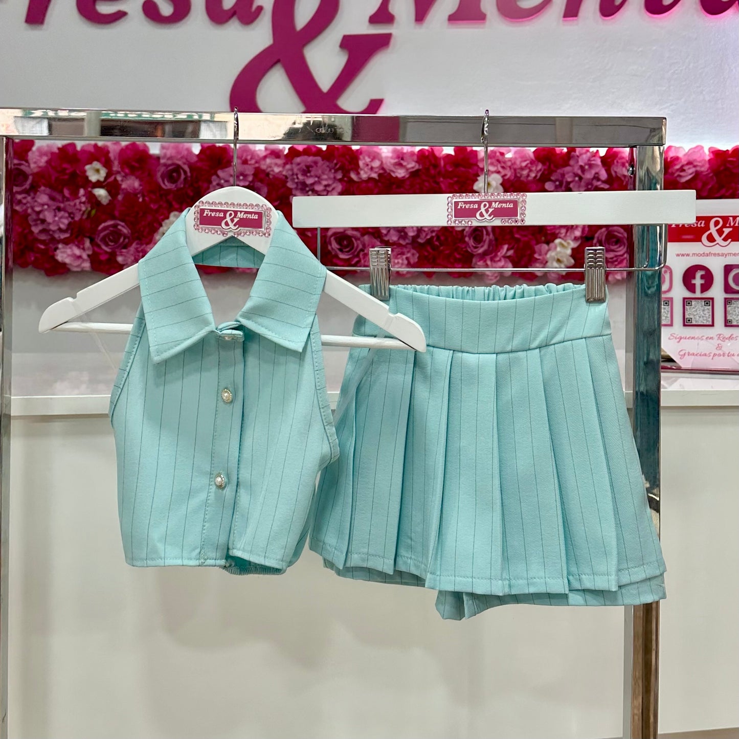 Conjunto chaleco y falda pantalón